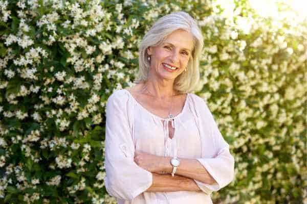 Older woman happy with urinary incontinence treatment King's Norton