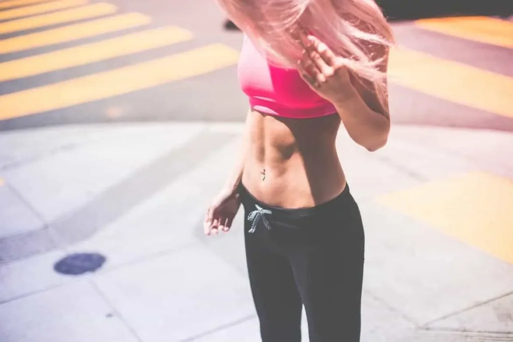 Woman with toned stomach after LA-EMS Body Sculpting Treatment King's Norton